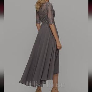 Formal tea length dress. Original packaging from JJ's House. Never worn.